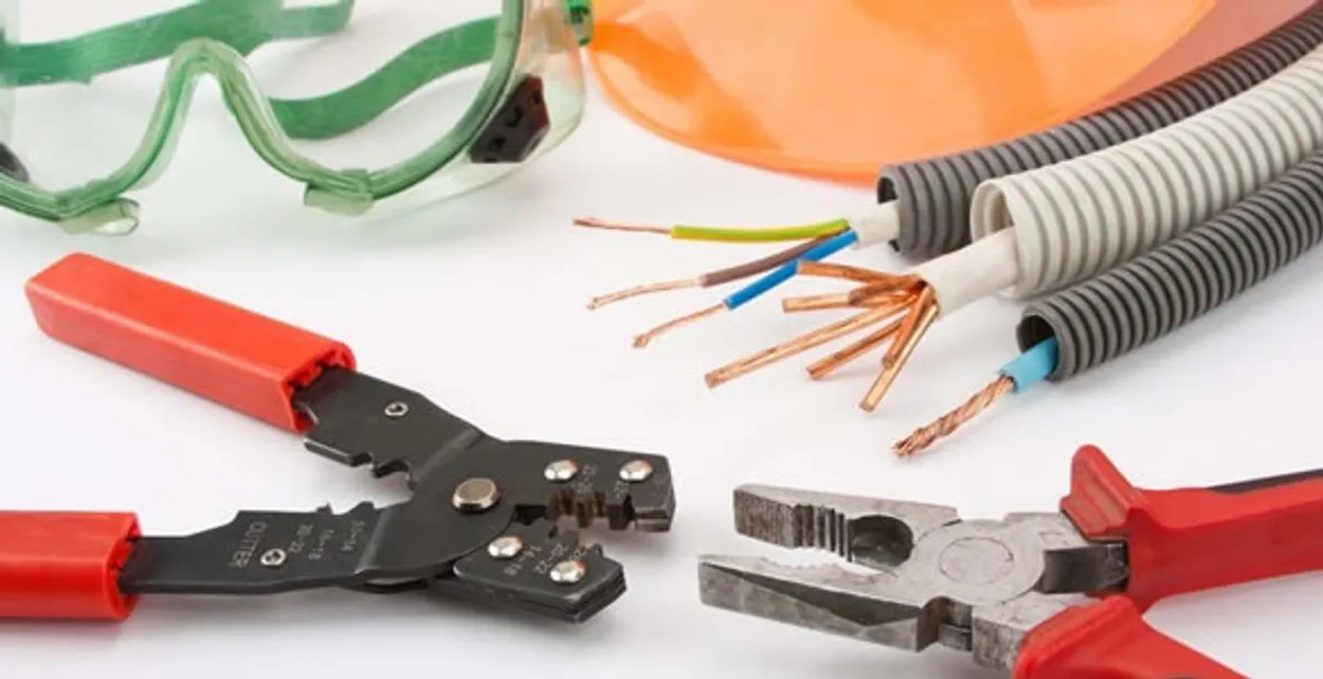 Electrical wiring repair with professional tools and safety equipment in Luxemburg, WI