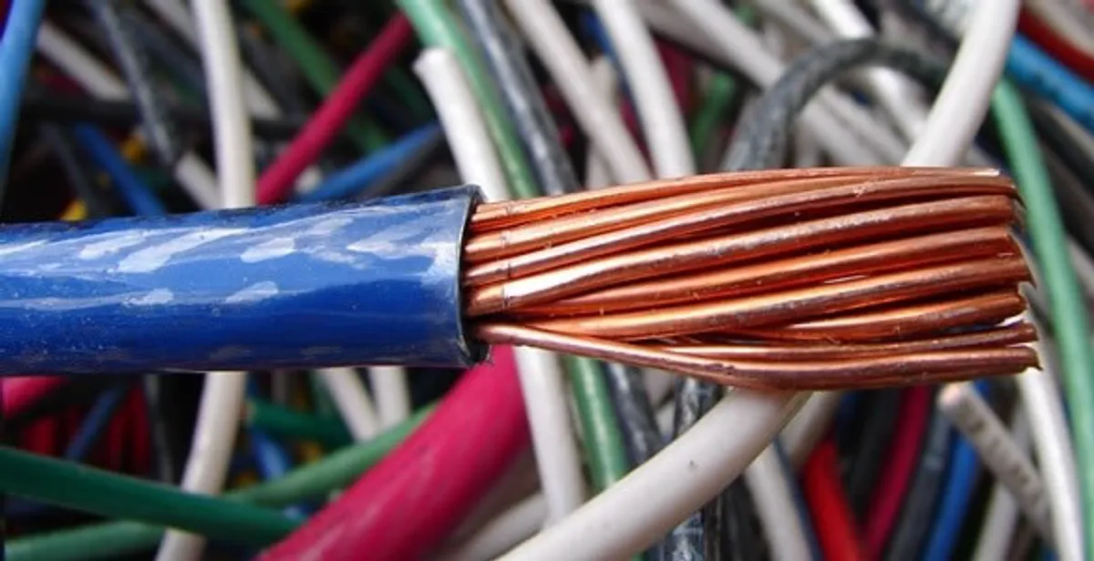 electrical wiring services showing exposed copper conductors and cable preparation in Green Bay, WI